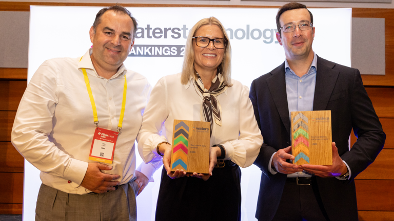 Rob Lane, Caroline Porter and Luca Samman of LSEG holding the WatersTechnology Rankings 2026 awards for Best Market Data Provider and Best Low-Latency Data Feed Provider at the London ceremony.